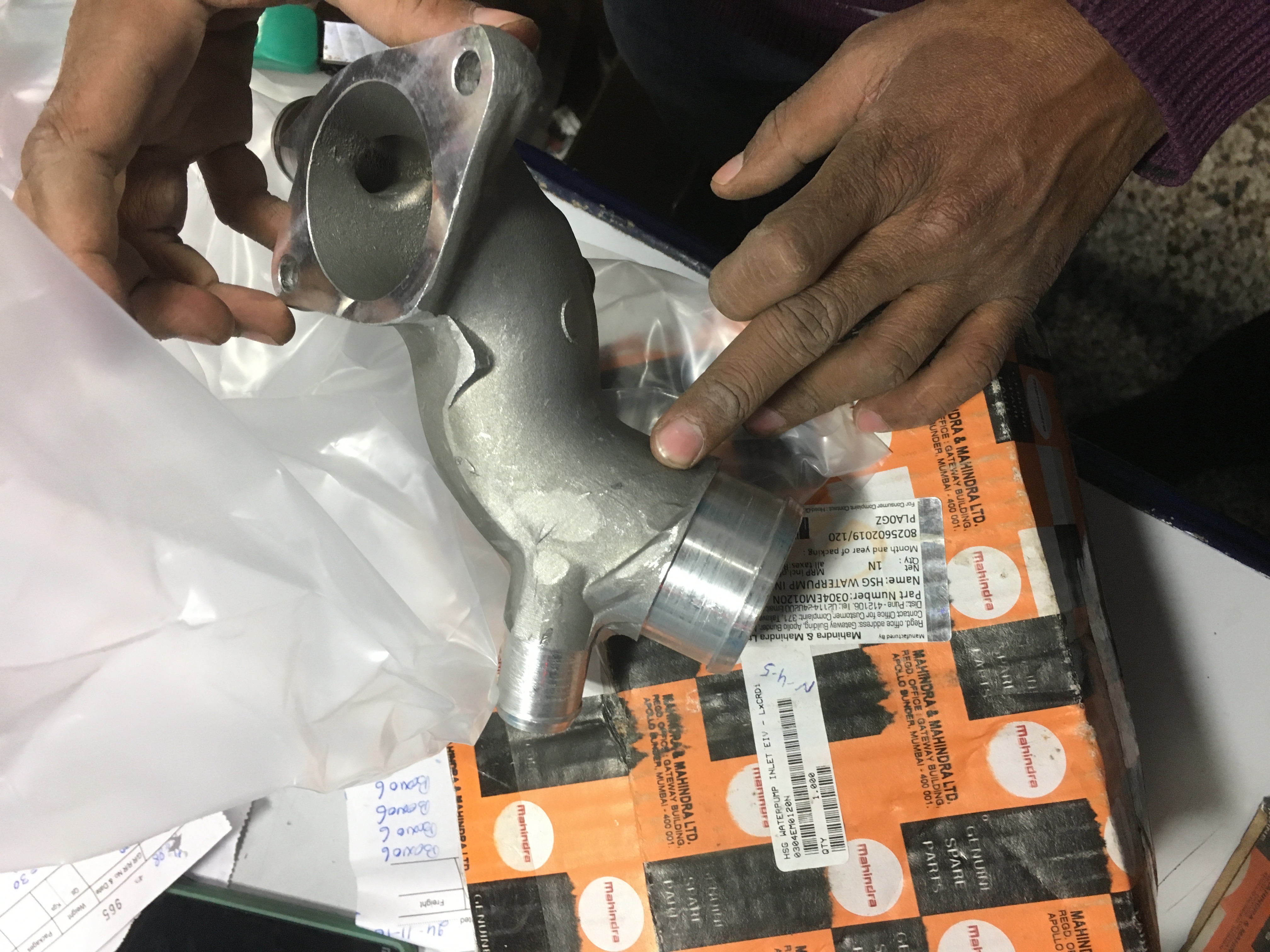 HOUSING WATER PUMP INLET - Part No: 0304EM0120N - MAHINDRA SCORPIO HOUSING WATER PUMP INLET 0304EM0120N STOCKID 769 - Photo
