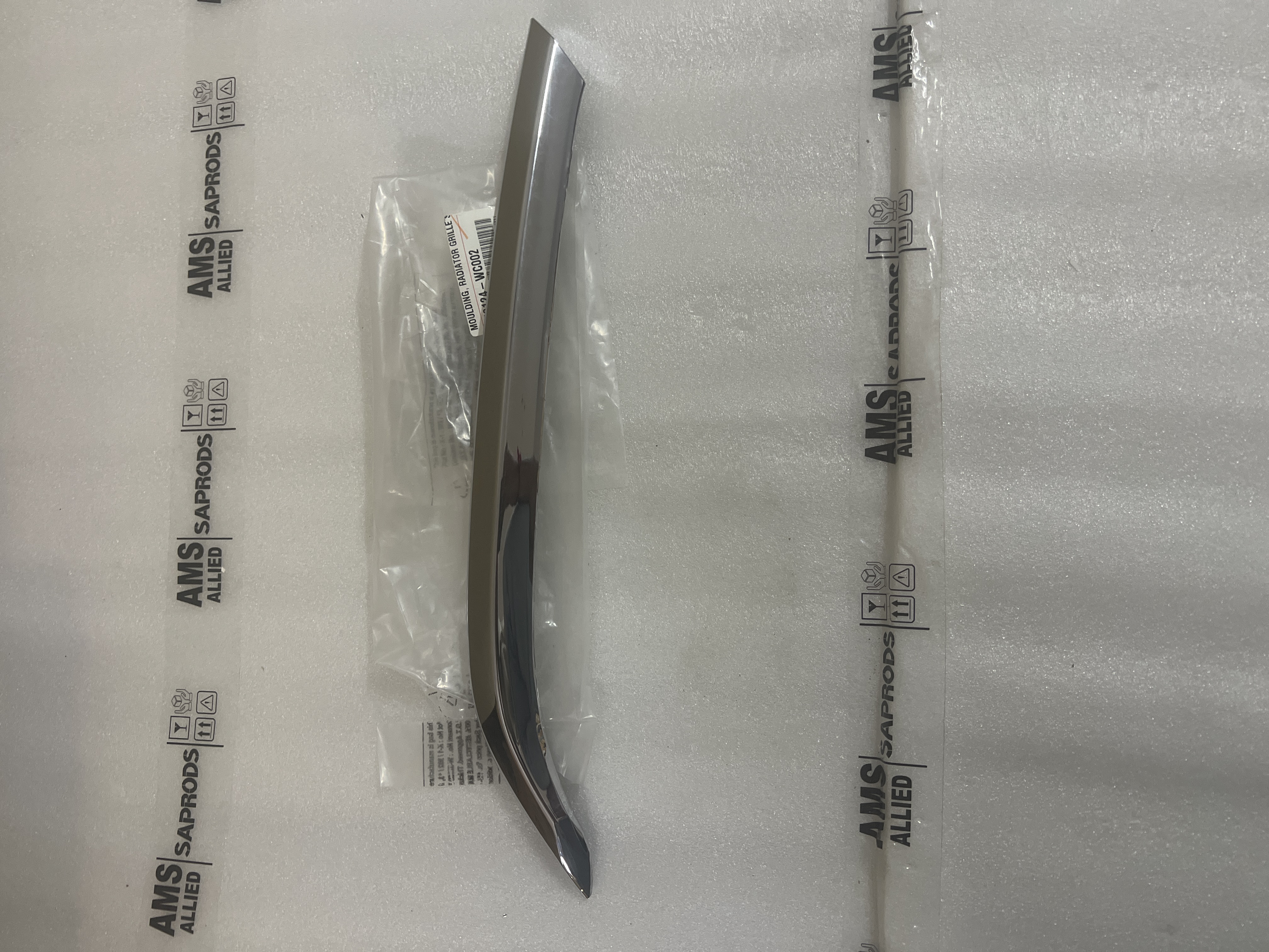 MOULDING, RADIATOR GRILLE SIDE, LH - Part No: 53124WC002 - Photo
